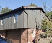 a house with a car parked in front of it